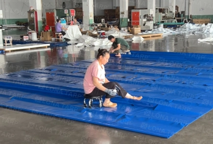 Repaired PVC tarpaulin